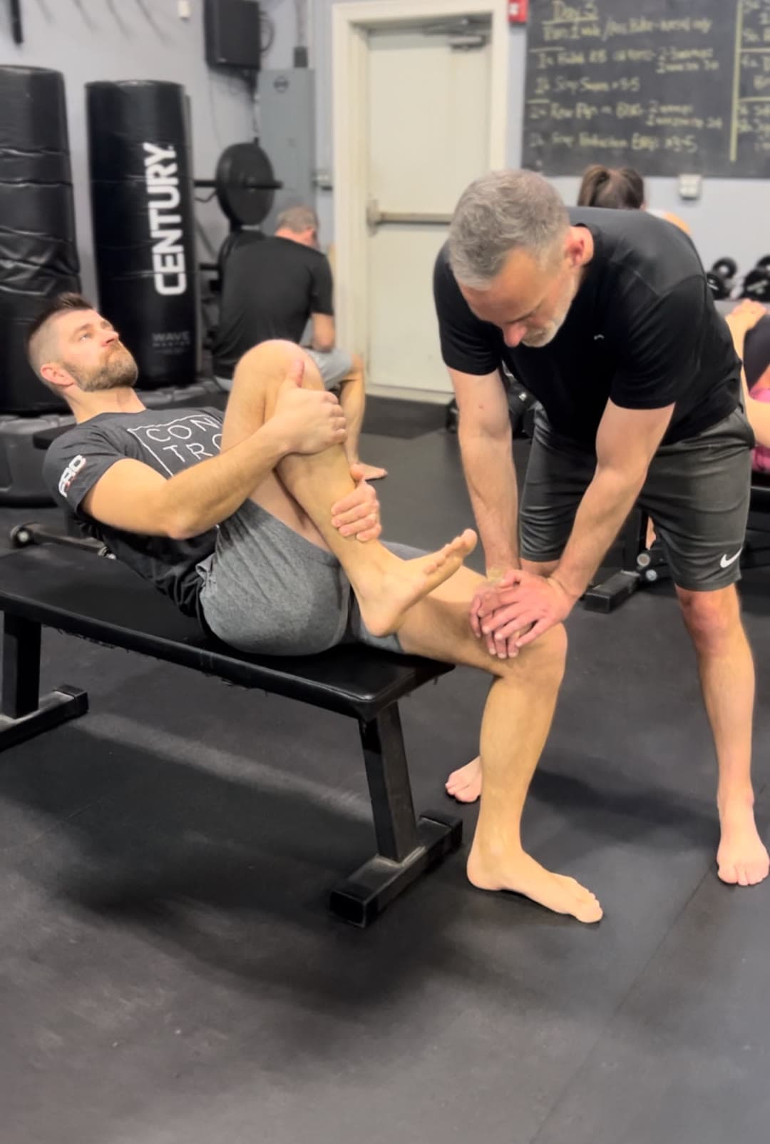 An EPS coach guiding a member one on one