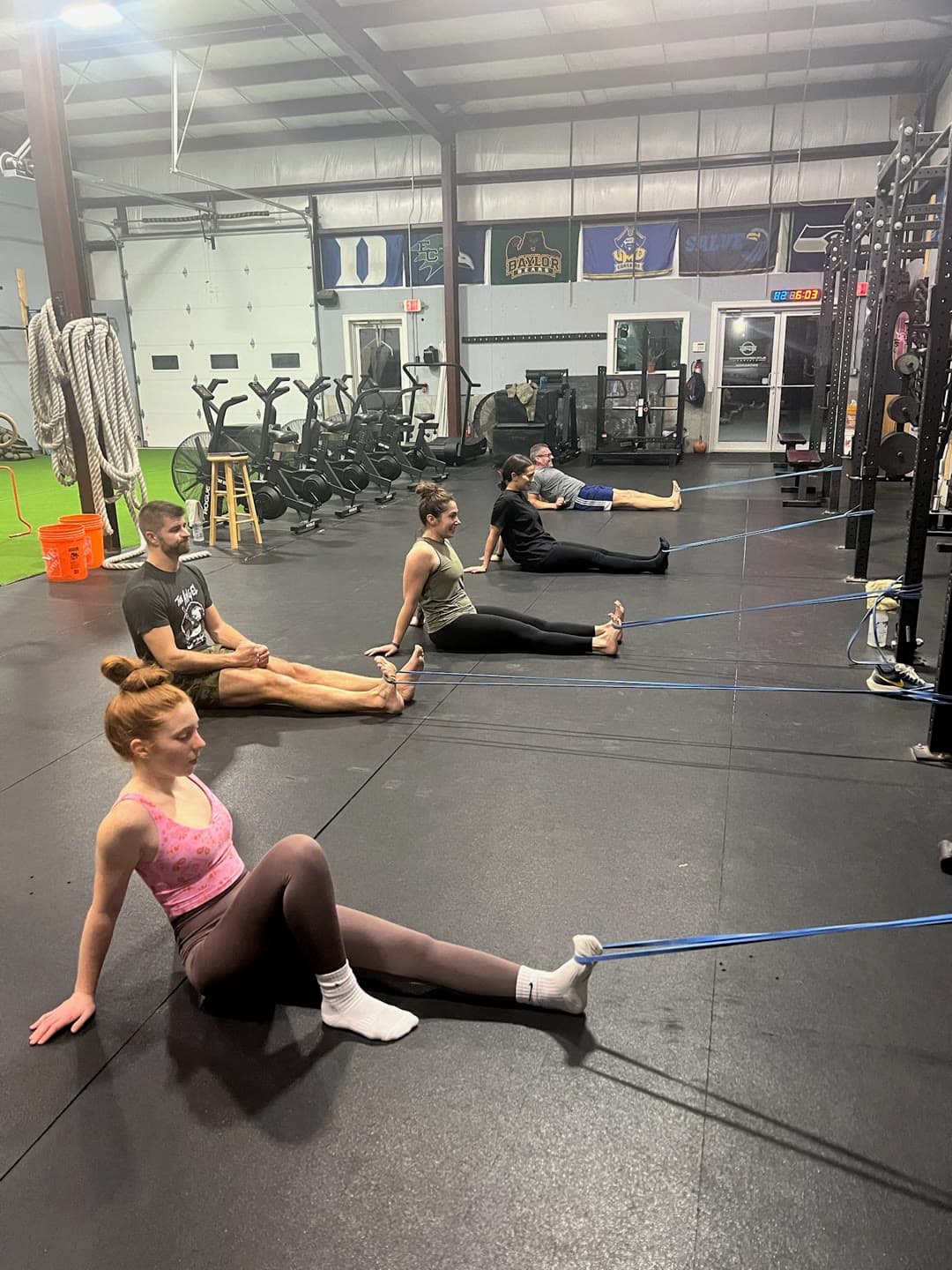 An EPS class stretching and laughing together